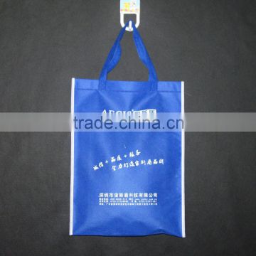 Blue nonwoven bag with white logo printing