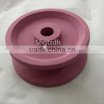 Textile ceramic guide wheel