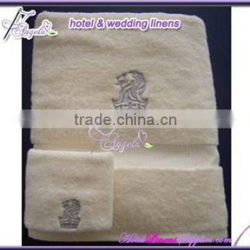 beige embroidered swimming pool towels, swimming towels for hotels, spas