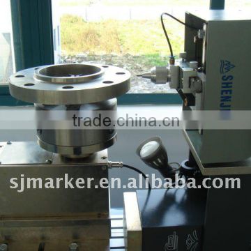 Pneumatic marking machine for flanges