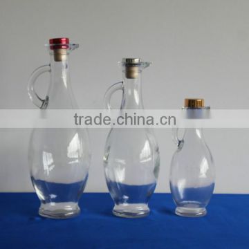WHOLESALE HANDLE OIL GLASS BOTTLES WITH CORK TOP