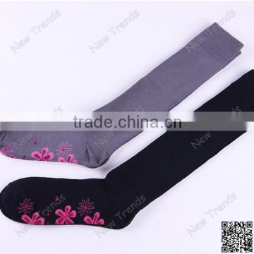 Solid grey and black knee high socks with flower pattern bottom