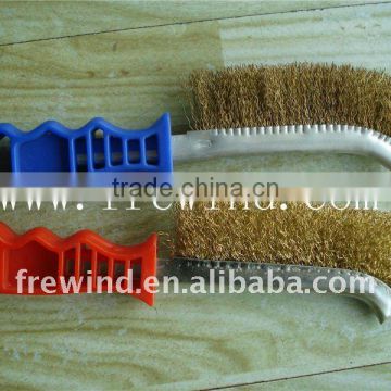 Scratch brush with plastic handle