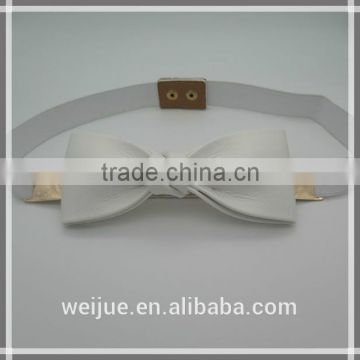 Bowknot elastic belt with metal plate and tetraena clasp