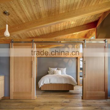 Sliding wooden barn doors for rustic bedrooms in holiday village