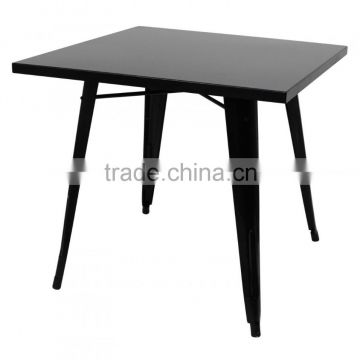 famous designer black metal table by xavier pauchard for dining room