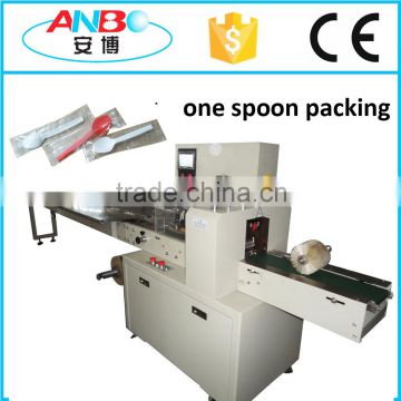 Automatic individual disposable plastic spoon packing machine