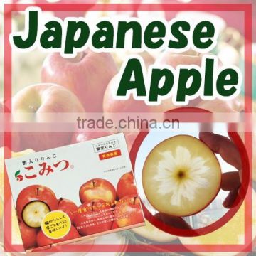 Safe sweet red Fuji apple Komitsu , packed in a container at low-temperature