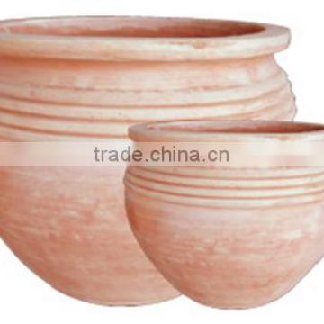 Clay terracotta jar with the beautiful style for your dreaming garden