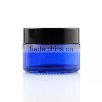1.5 oz painting blue cosmetic jar with black cap