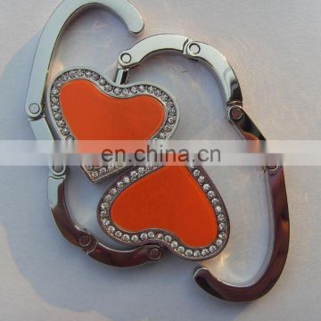 hot sale fashion heart shaped bag hanger