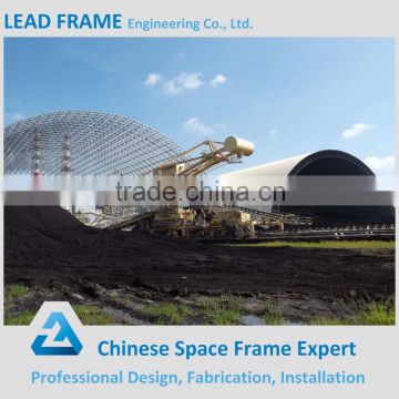 Metal space frame arch coal storage building