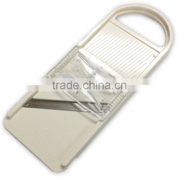 Japanese smooth vegetable fruit cutter with safety holder