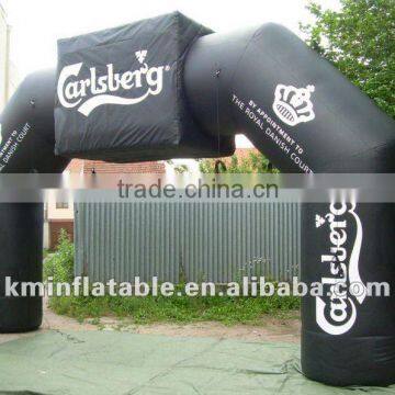 black inflatable arch with billboard