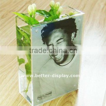 clear acrylic vase with photo frame