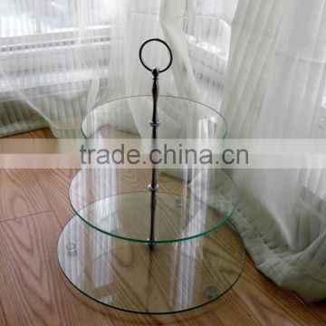 round -tier tempered glass product for cake in the kitchen