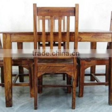 Natural finish wooden dining table with four chairs