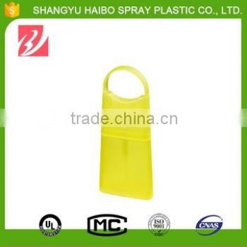 Small delicate card-shape plastic bottle of backpack form