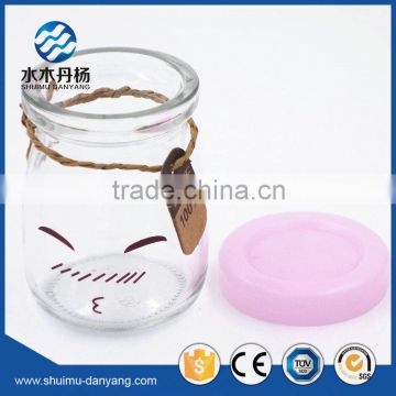 Hot sale 100ml fancy glass pudding bottle with cap