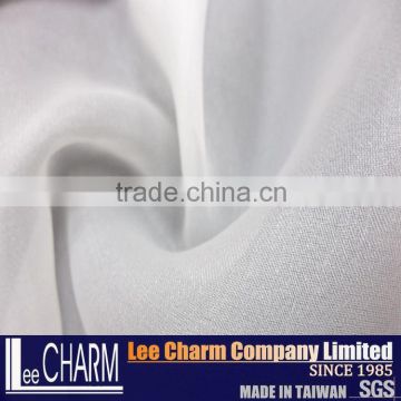 Wholesale Taiwan Cheap Quality 100 polyester Plain Organza Fabric for Girl Dress