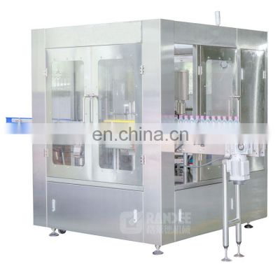 Automatic rotary OPP BOPP hot melt glue labeling machine for water CSD juice filling production line