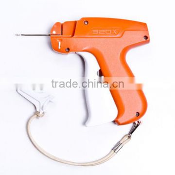 Portable tag gun for clothing price label