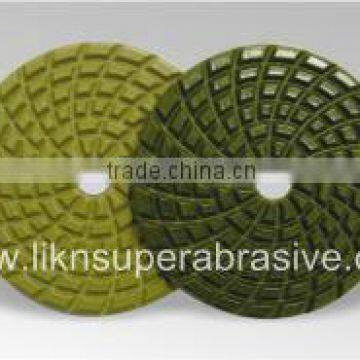 Wet polishing pads with QRS