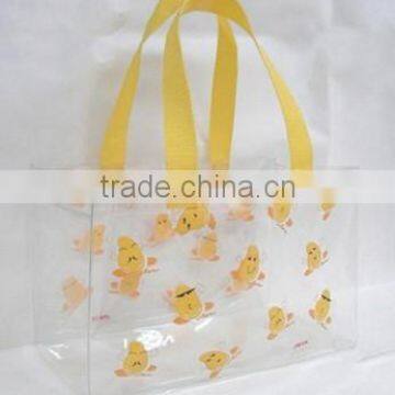 PVC wholesale foldable plastic handbag with holder