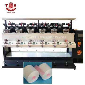 Soft package cone winding machine before yarn dying using