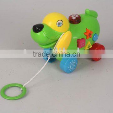 BATTERY OPERATED PULLING DOG WITH LIGHT & MUSIC