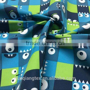 cute naughty cartoon eye print plaid print taslon fabric for kid beach short