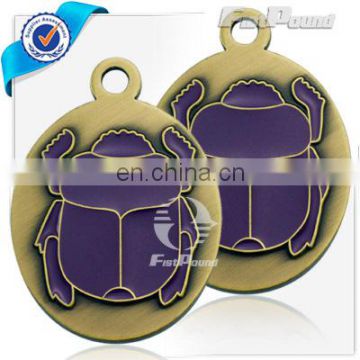 Anti gold plated purple beetle medal