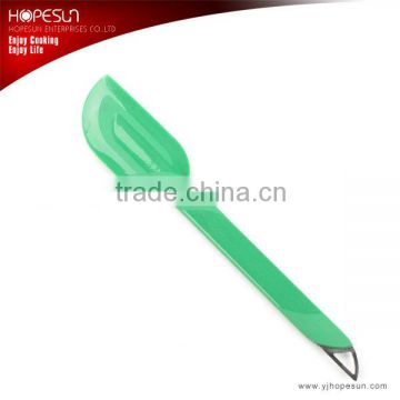 Heat resistant durable green silicone scraper for cooking                        
                                                Quality Choice
