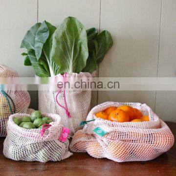 Reusable compostable cotton muslin veggie or fruit storage bag for produce