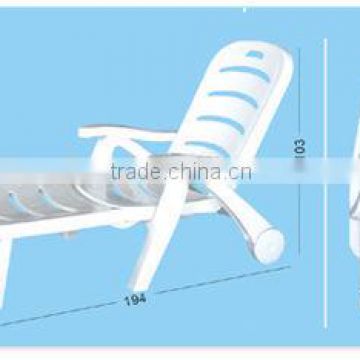 White plastic commercial beach chairs