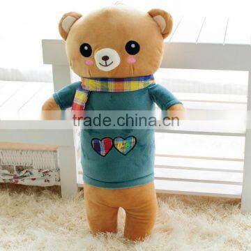 Soft plush bear toy with clothes and colorful scarf