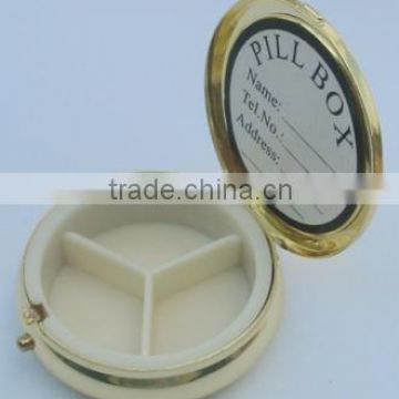 Metal pill box in round shape with 3 pill department