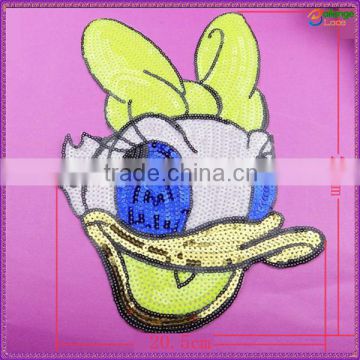 China manufacturer wholesale sequin garment patches for kids textile