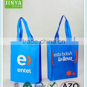 Alibaba China resuable double handle non woven oem luggage bags for traveling.