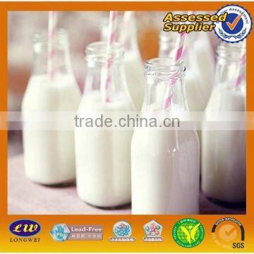 Small clear good quality glass milk bottle
