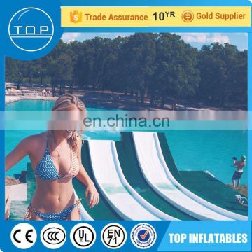 Customized game igloo kids used inflatable water slide for sale with EN14960