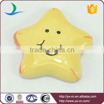 cute yellow pentagram ceramic hanging decoration with big smile