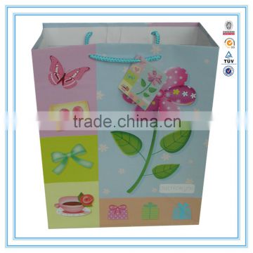 China alibaba wholesale cheap printed custom paper shopping bag for shopping