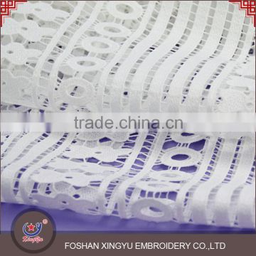 Factory specializing made 130-135 cm micro fiber polyester chemical guipure cheap lace fabric for garment dress
