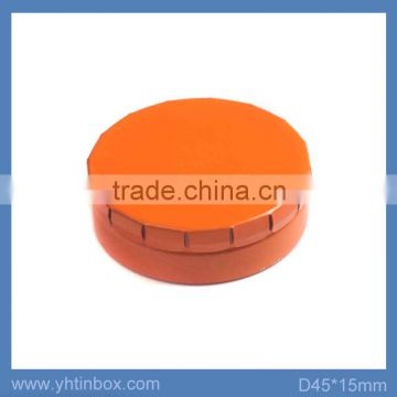 round click clack tin in candy packaging