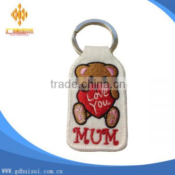 Factory direct customized cheapest embroidery cute beer key chain