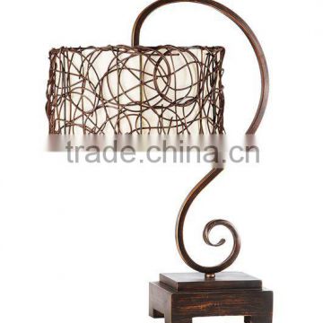 Vintage scroll metal table lamp with rattan shade
