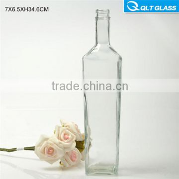 Decal surface handling amber glass vodka bottle