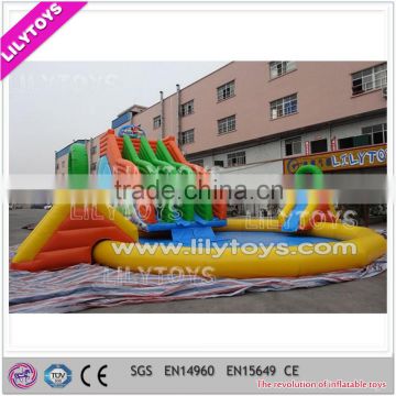 Chinese export rainbow inflatable ground water park for sale, kids inflatable amusement park