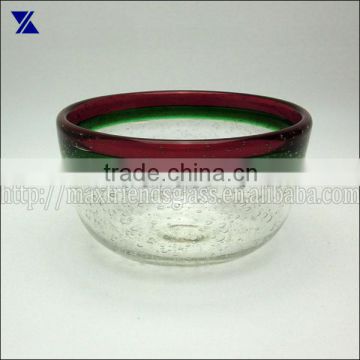 clear with small bubble glass bowl red and green rim